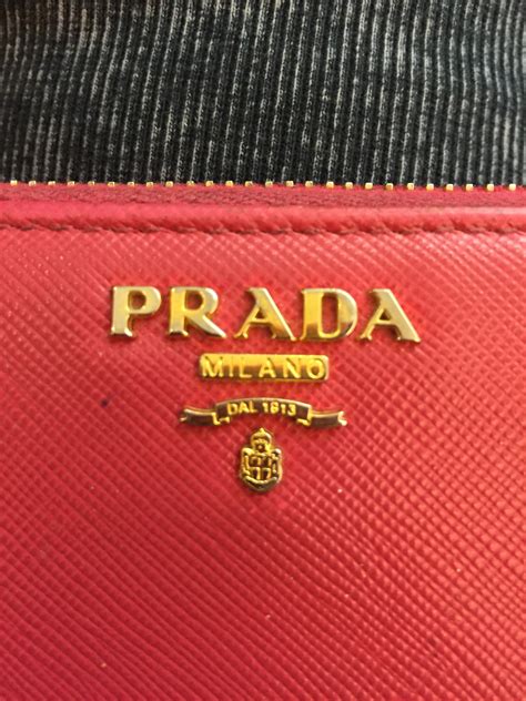 prada wallet interior fake vs real|Prada wallet counterfeit.